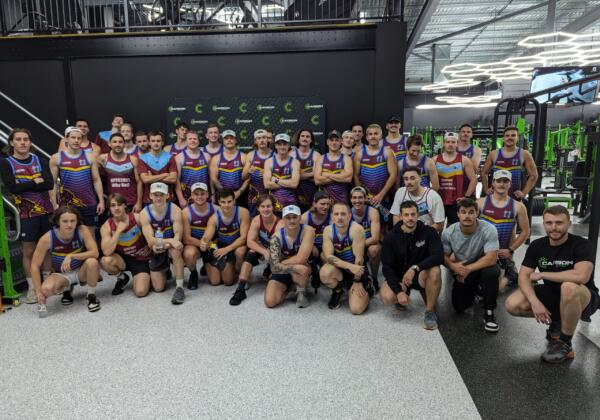 Local football club team gathered on the strength floor after a group training session at Carbon Gym Geelong