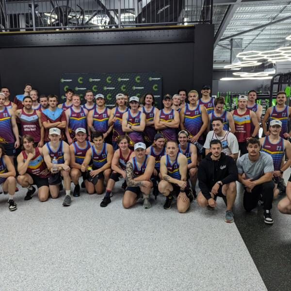 Local football club team gathered on the strength floor after a group training session at Carbon Gym Geelong