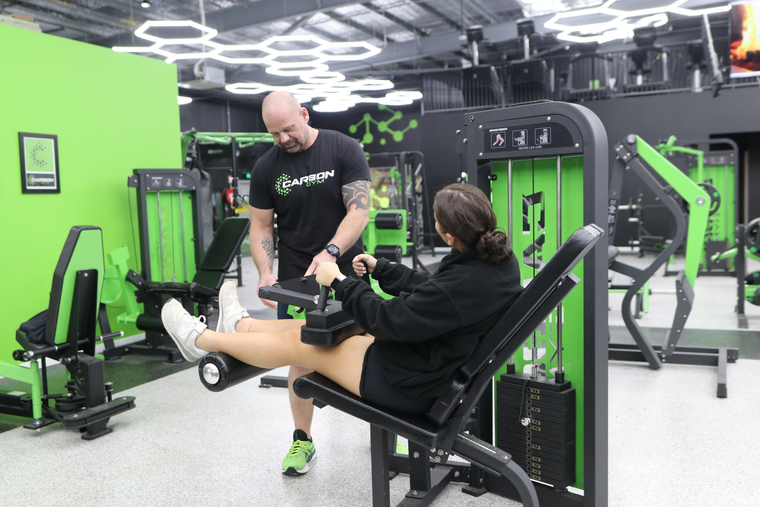 Personal trainer working with a member at Carbon Gym Geelong