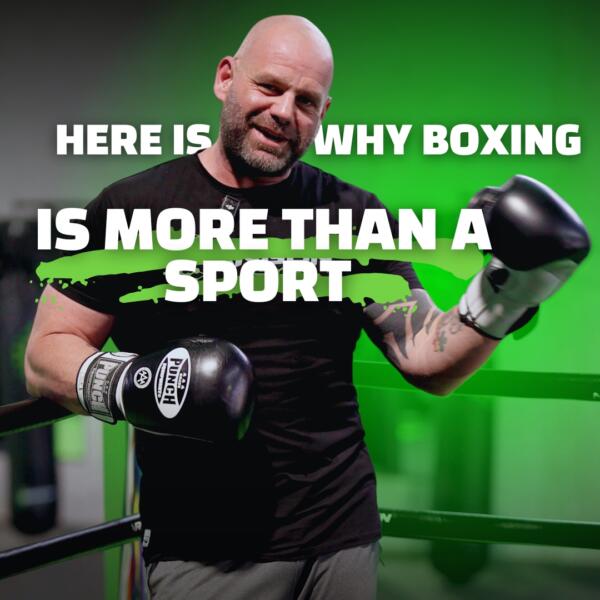 Boxing coach in gloves standing in the ring at Carbon Gym Geelong, with text overlay 