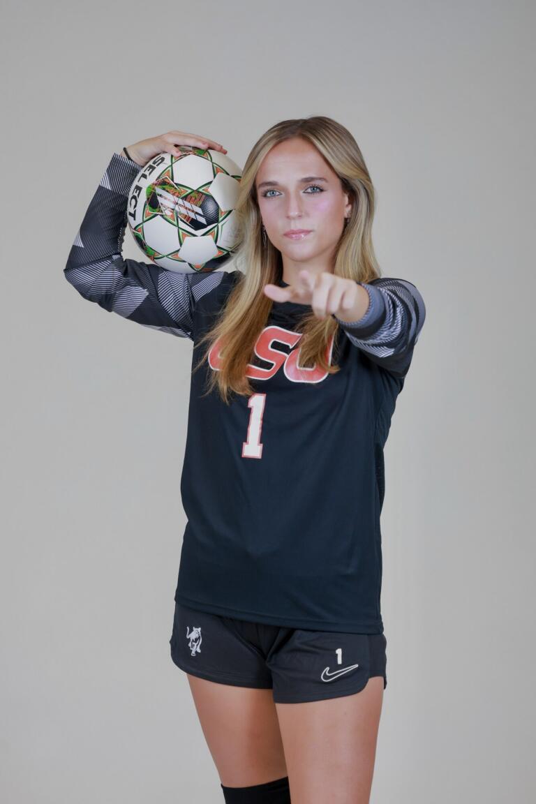 Heidi Harris studio portrait holding a soccer ball, Columbus State Cougars