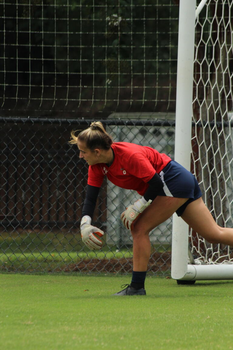 Heidi Harris making a diving save for Columbus State Cougars
