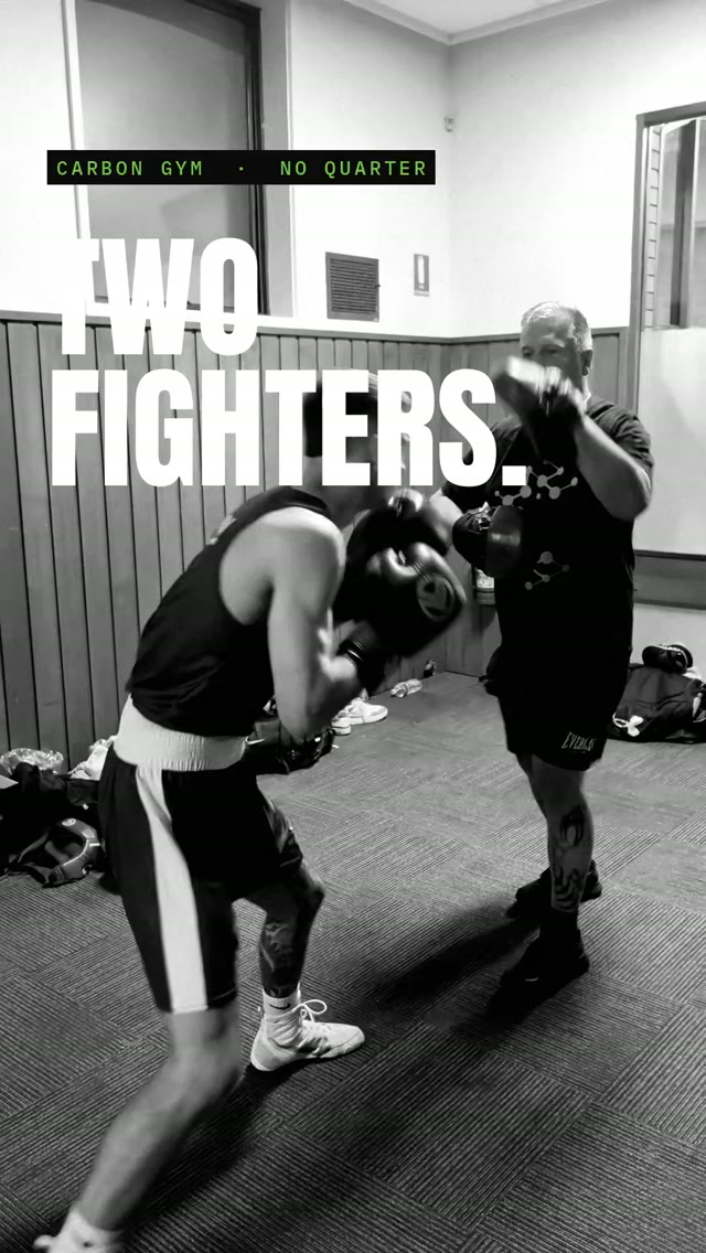 No Quarter Boxing results: Carbon Gym coach working pads with a fighter in Norlane